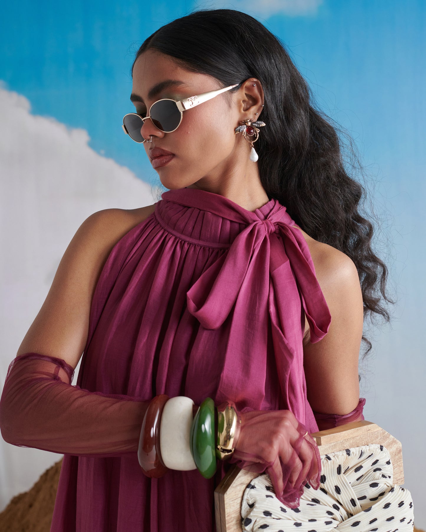 Close-up of halter neck design on Falsa Sharbet Maxi Dress in deep fig purple