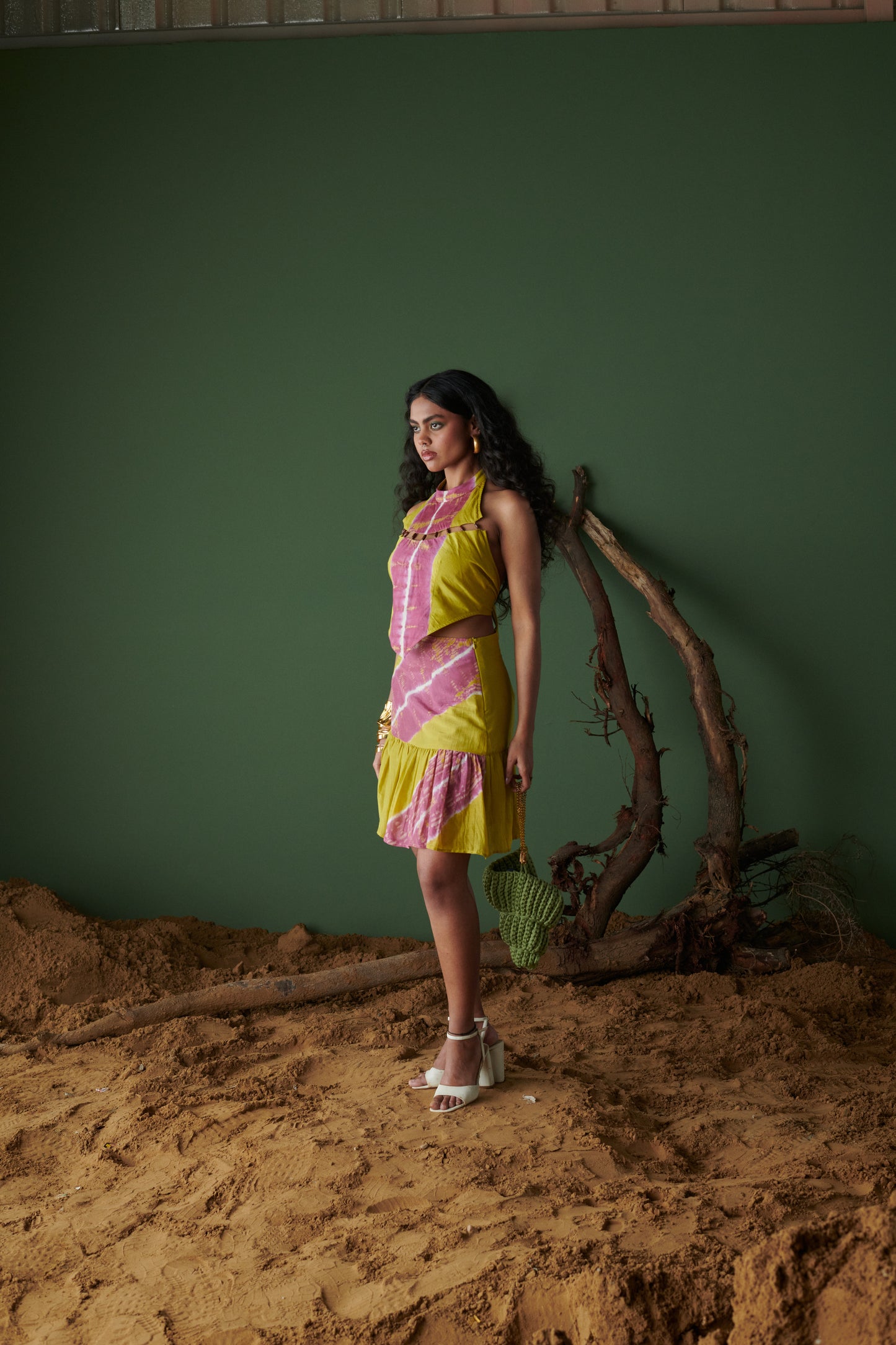 Model walking wearing Khatta Jal-Jeera Skirt in mustard yellow and deep pink
