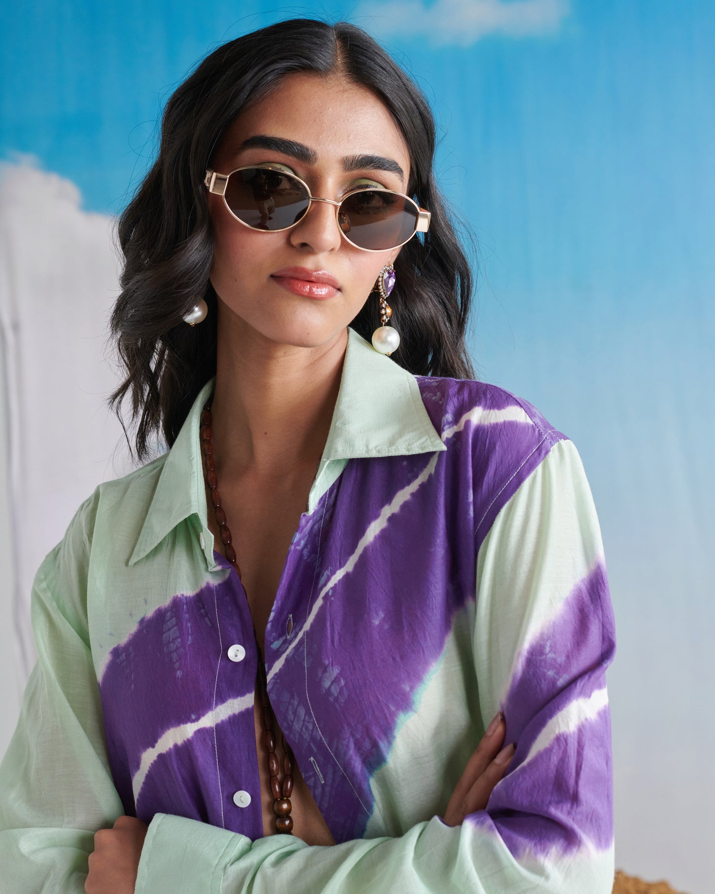 Closeup of Naarangi Aasmani Leher shirt showing elegant wave print details.