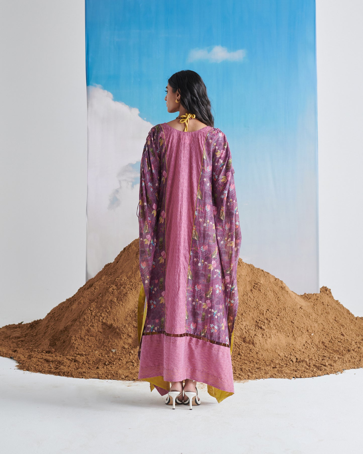 Back view of Naarangi Falsa Fantasy kaftaan with purple gradient, stylish flowing dress.