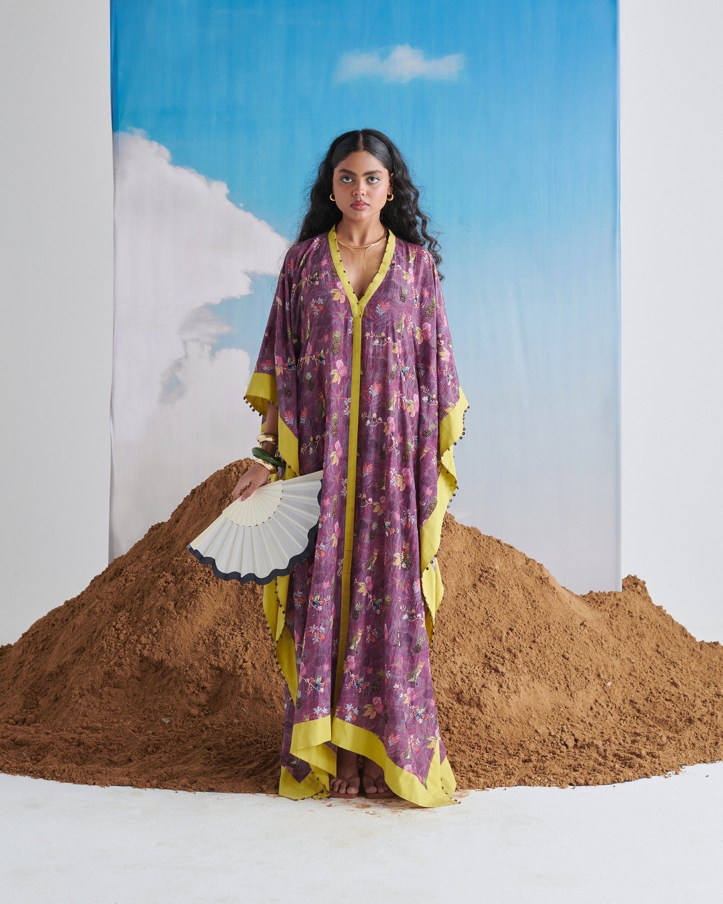 Centered full-length front look in Plum Passion kaftaan with bead-trim lime placket.