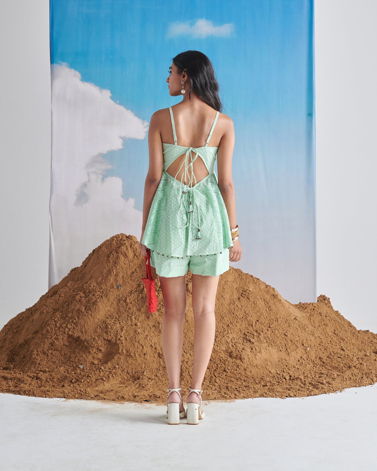 Naarangi Pudina Pop Short Set in mint green, full back view with tie-up detail, flared layered top and matching shorts.