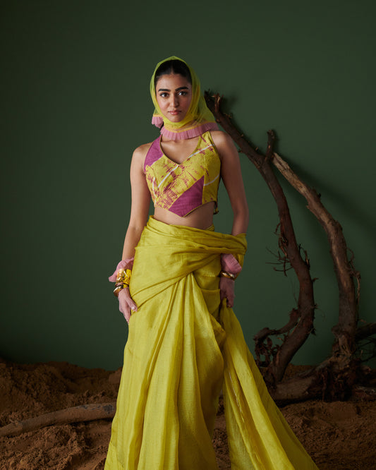 Model wearing Nimbu Soda Pop saree with blouse by Naarangi, handwoven in bright lime yellow with modern styling, perfect for festive and party wear in India.