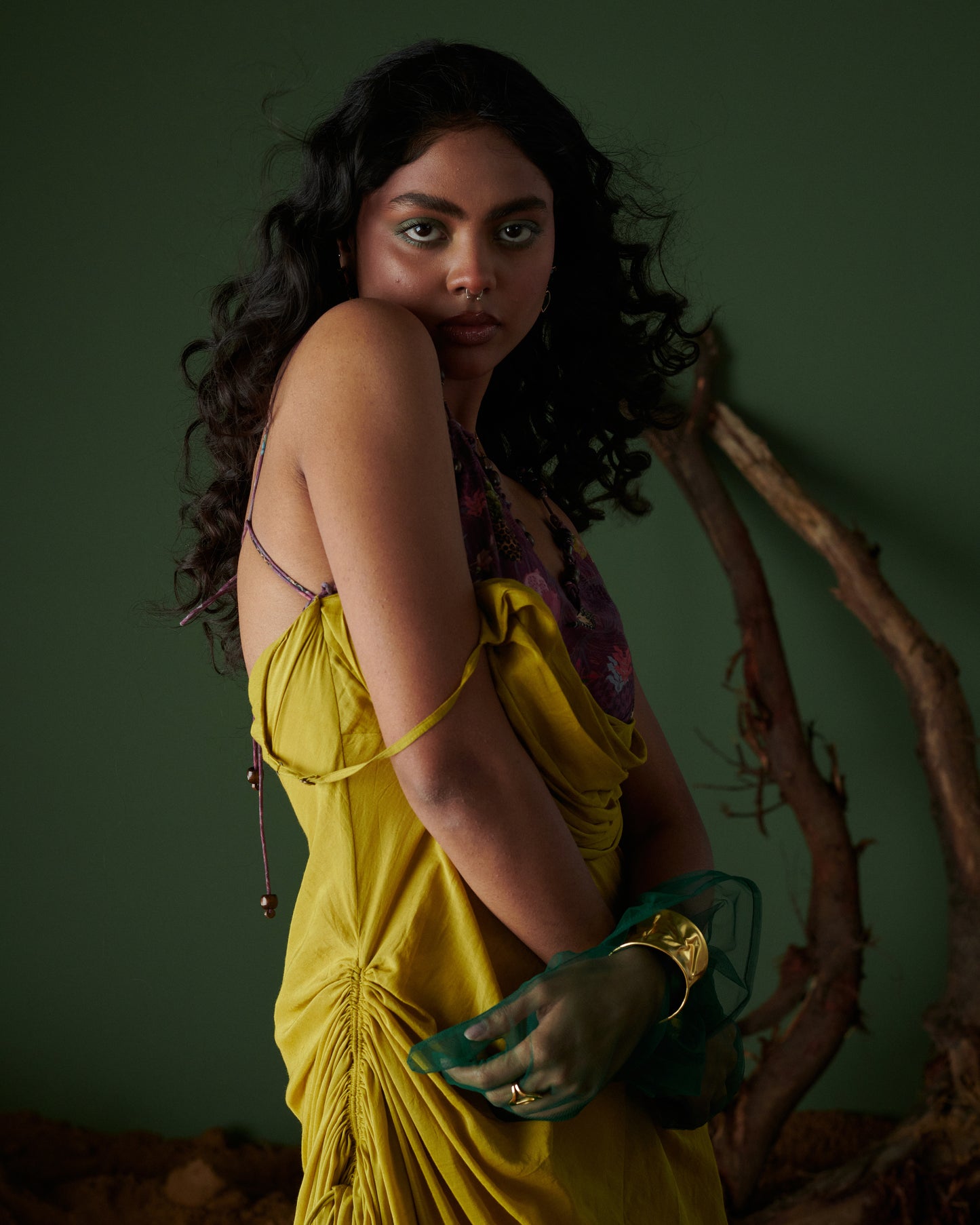 Front view of Sunheri Zest Dress in vibrant yellow with Jungle Feast print, ruched side and back tie-up by Naarangi.