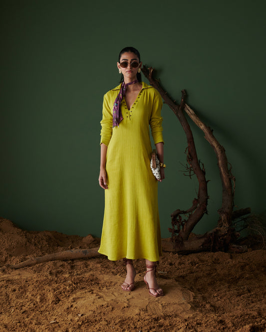 Model wearing Aam Panna mango yellow midi dress by Naarangi, styled with scarf, sunglasses, and statement earrings.