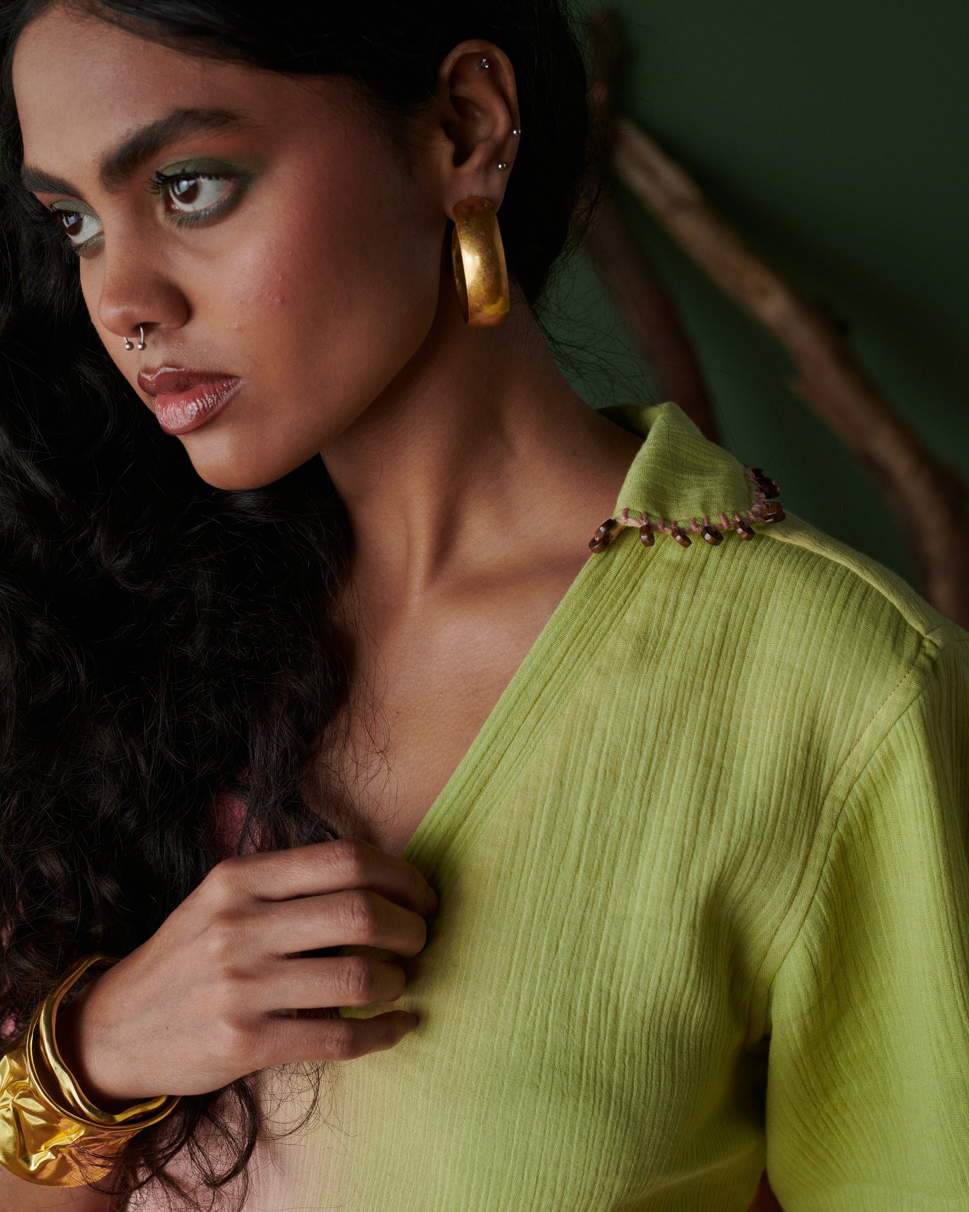 Barfi Bloom Co-ord Set neckline close-up showing delicate bead shoulder detailing on hand-dyed pink and green fabric.