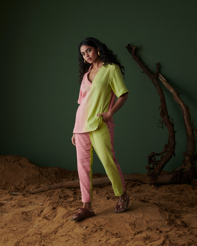 Side view of Barfi Bloom Co-ord Set in hand-dyed pink and green, featuring relaxed fit, v-neckline and chic button accents.