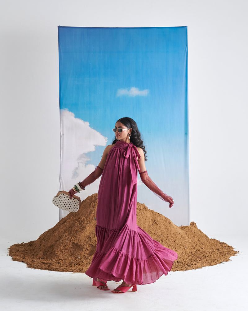 Model walking wearing Falsa Sharbet Maxi Dress in deep fig purple