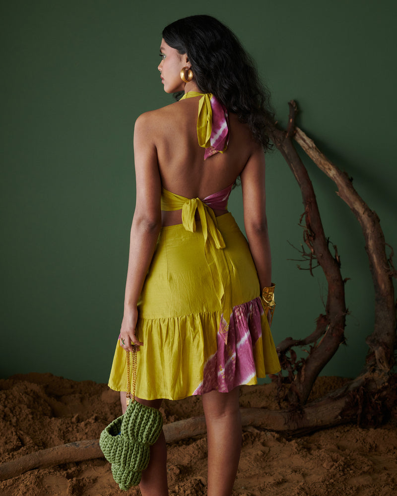 Back view of Khatta Jal-Jeera Skirt in mustard yellow and deep pink with asymmetric hem