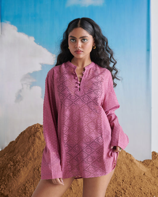 Front view of Kismi Kurta in elegant pink, featuring intricate textured embroidery, long sleeves, and relaxed fit design.