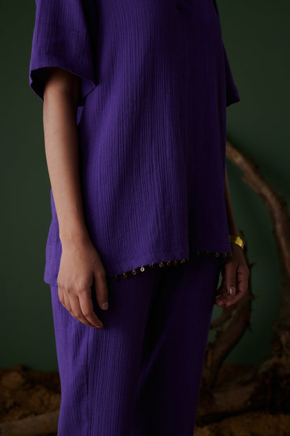 Detailed view of Kool Khatta Co-ord Set in purple cotton, showing textured fabric and bead embellishments on hemline.