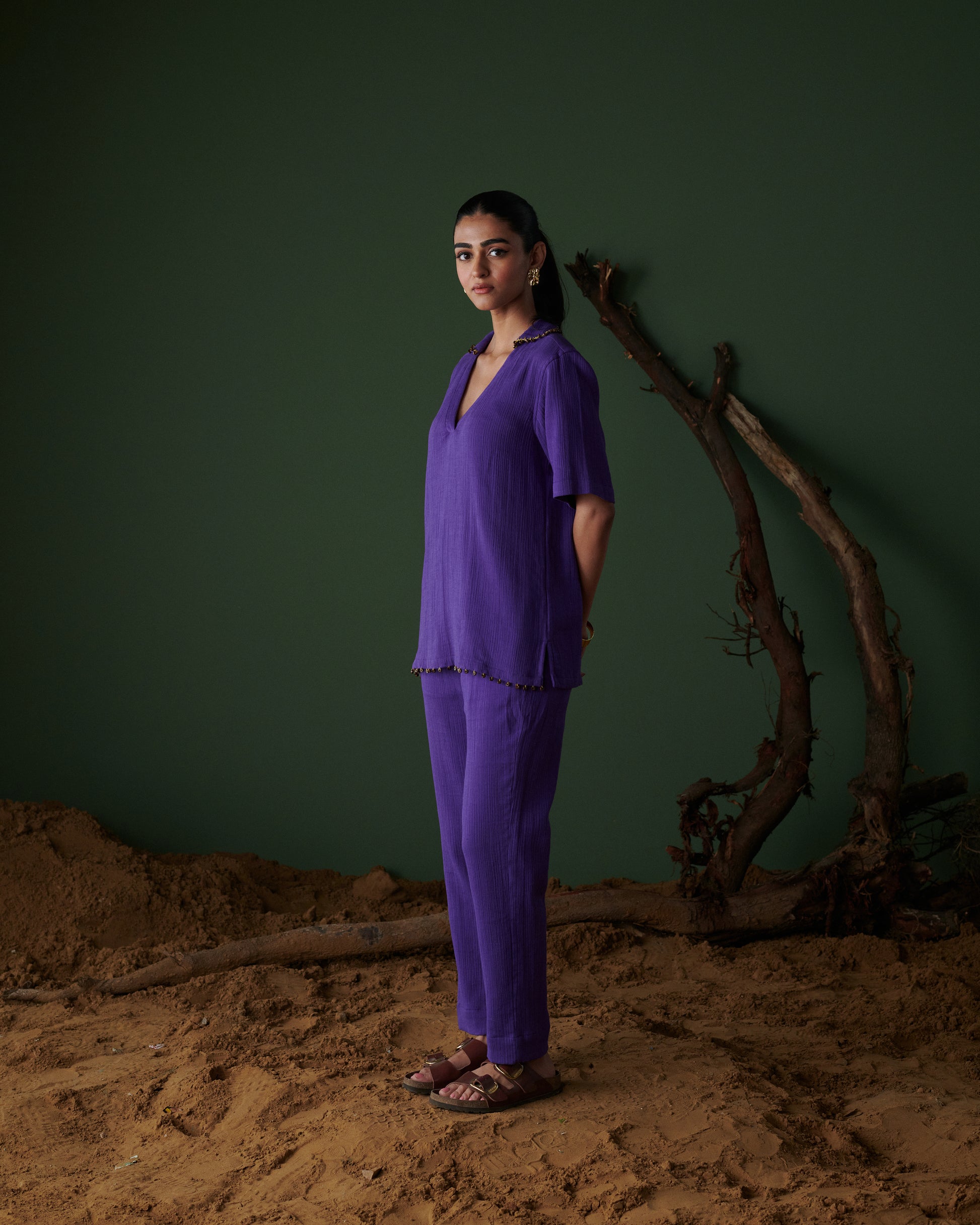 Side profile view of Kool Khatta Co-ord Set in deep purple, showcasing relaxed silhouette and minimal design details.