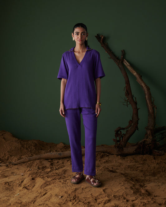 Front view of Kool Khatta Co-ord Set in deep purple cotton textured fabric, featuring V-neck top with matching straight pants.