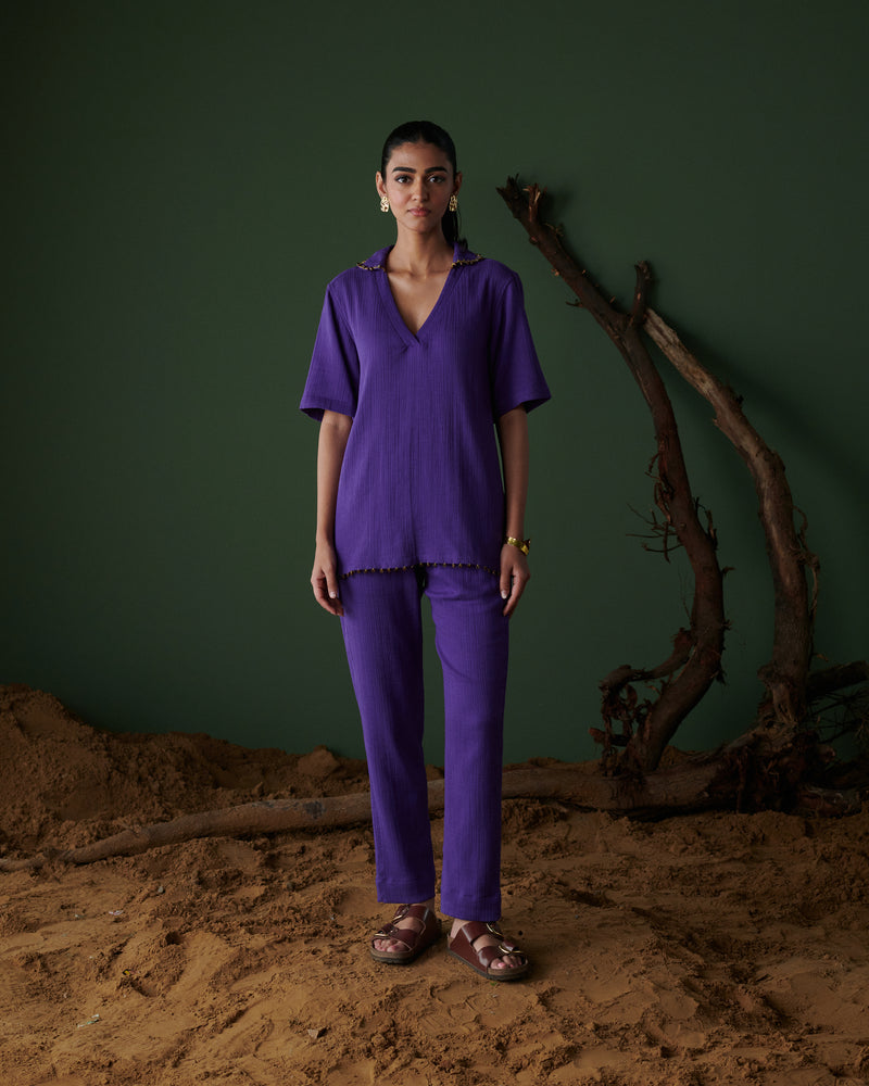 Front view of Kool Khatta Co-ord Set in deep purple cotton textured fabric, featuring V-neck top with matching straight pants.