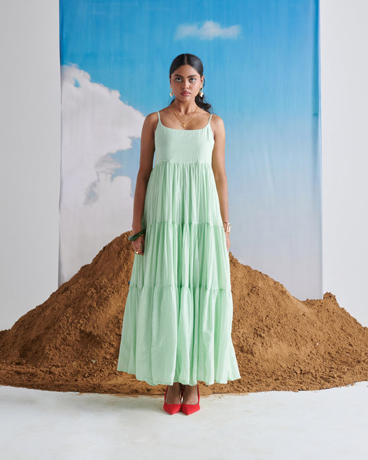 Front view of Minty Mehfil green maxi dress with tiered layers and sleeveless design.