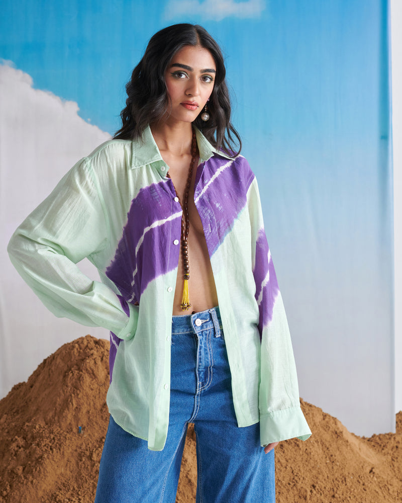 Model wearing Naarangi Aasmani Leher blue shirt with wave print, stylish front pose.