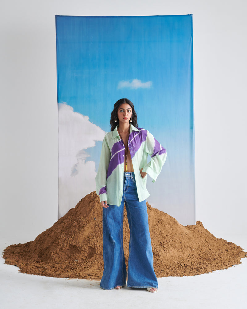 Front view of Naarangi Aasmani Leher shirt, ocean blue wave-inspired pattern design.