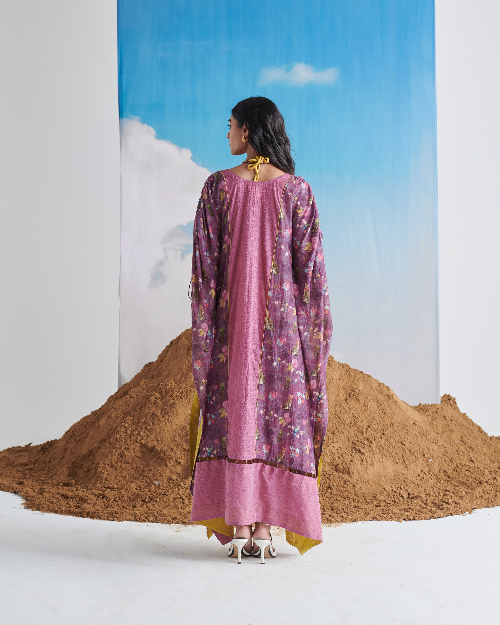 Back view of Naarangi Falsa Fantasy kaftaan with purple gradient, stylish flowing dress.