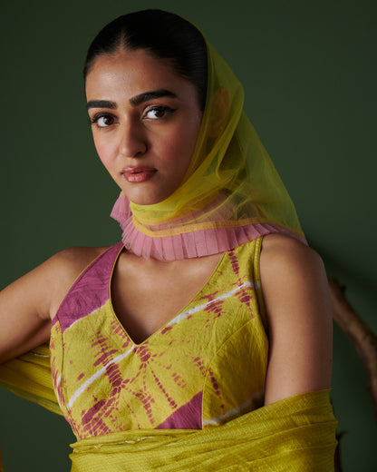 Close-up of model in Nimbu Soda Pop saree with blouse by Naarangi, showcasing lime yellow handwoven fabric with magenta accents and net dupatta, festive ethnic wear India.